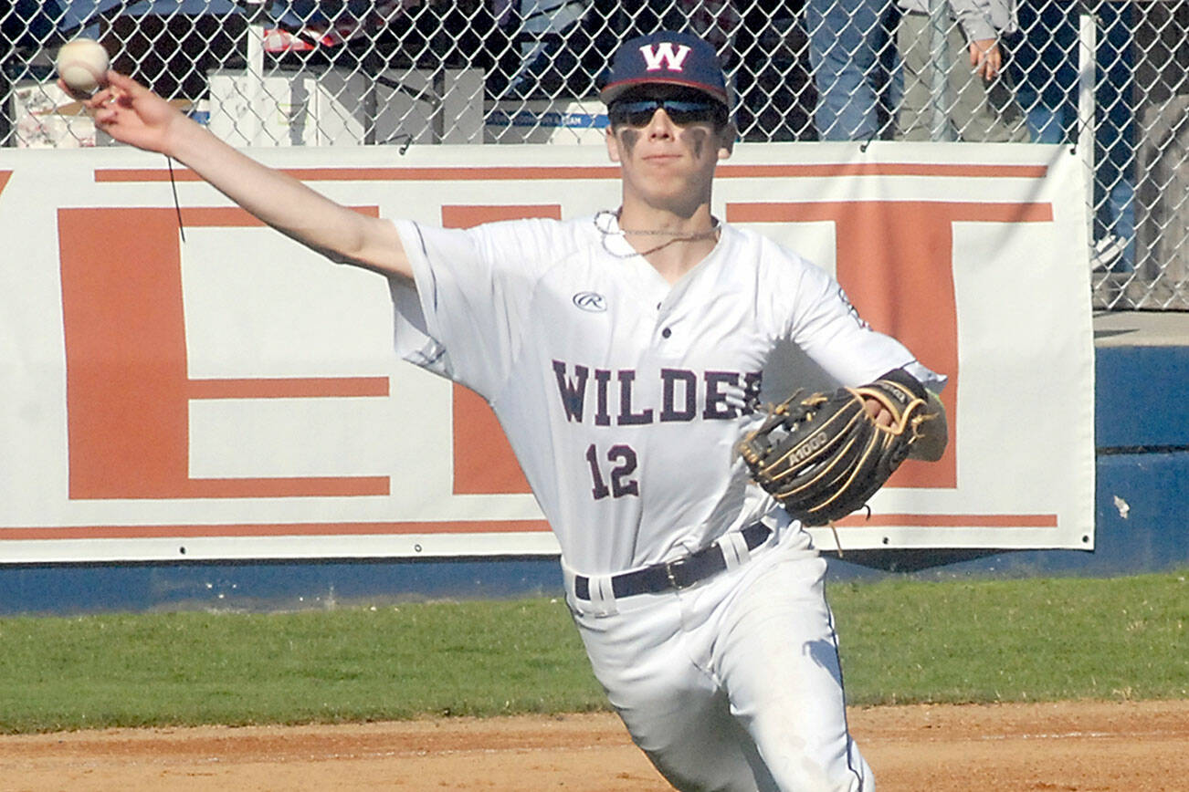 Wilder Senior third baseman Landon Siebel makes a throw to first during a 2021 contest at Civic Field. Tryouts for the American Legion baseball program will be held later this month. (Keith Thorpe/Peninsula Daily News)