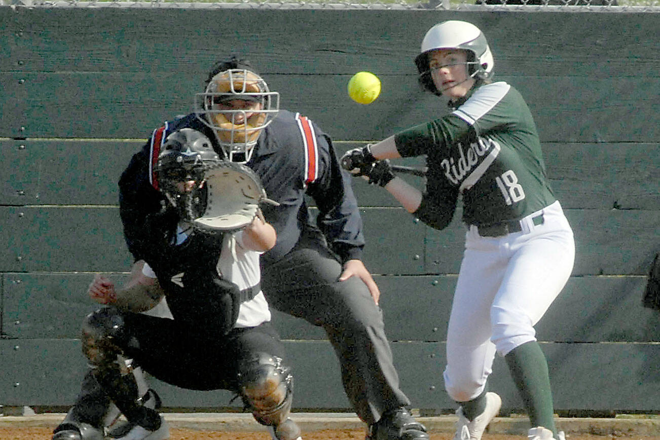 Keith Thorpe/Peninsula Daily News
Port Angeles' Lily Halberg bats in an April game against Kingston at Dry Creek School in Port Angeles.