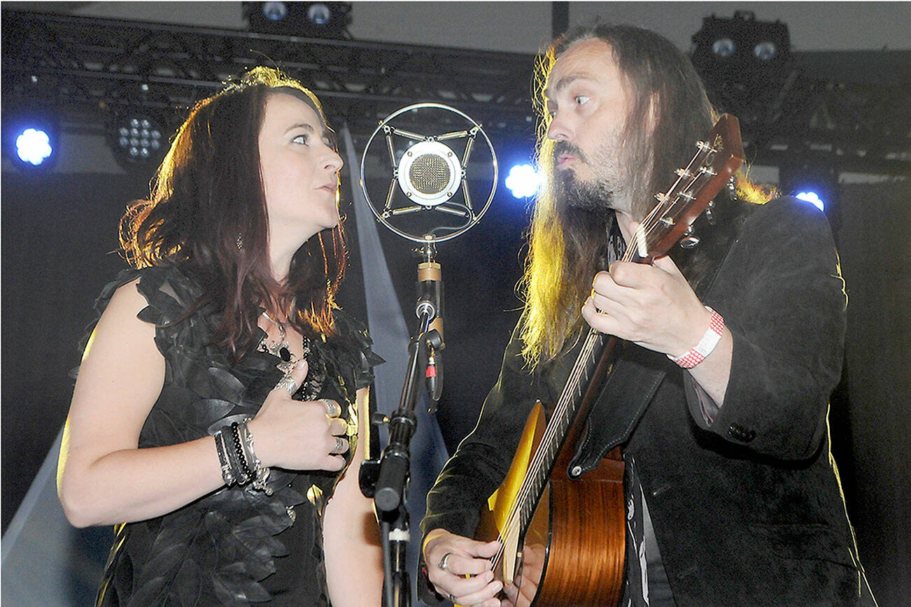 The indie folk duo The Black Feathers, Sian Chandler and Ray Hughes, who base themselves in Gloucestershire in the United Kingdom, perform on Saturday at Vern Burton Community Center during the Juan de Fuca Festival of the Arts. (Keith Thorpe/Peninsula Daily News)