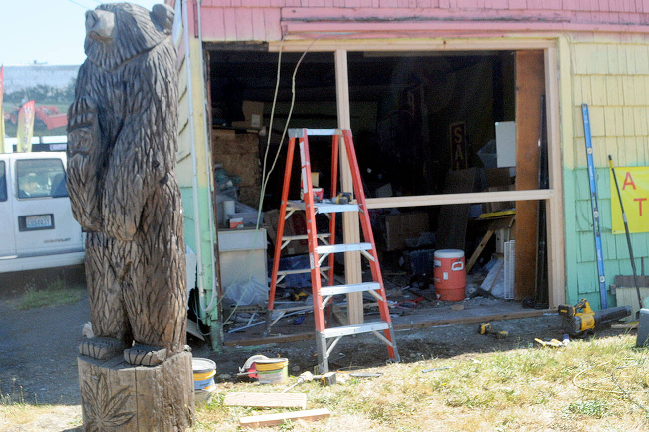 Keith Thorpe/Peninsula Daily News
A gaping hole opens the side of a smoke and paraphernalia shop near U.S Highway 101 and Mount Pleasant Road after it was struck by a vehicle Tuesday morning.