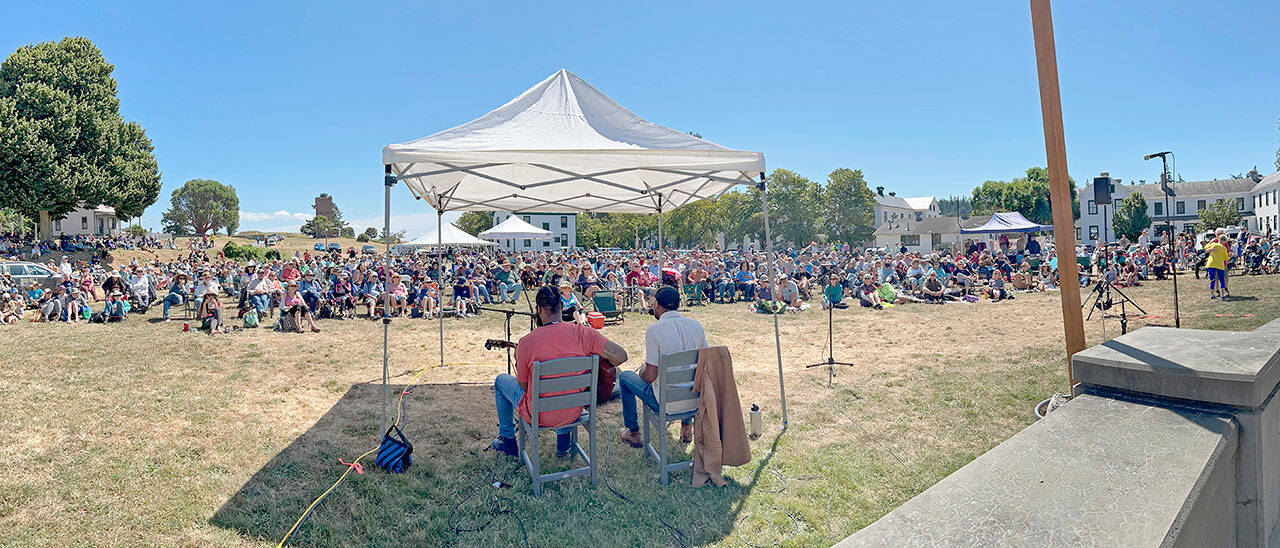 The largest audience of the summer showed up for the final Free Fridays at the Fort blues concert by performed by musicians Jayy Hopp, left, and Andrew Alli on the Commons at Fort Worden State Park on Friday. (Steve Mullensky/for Peninsula Daily News)