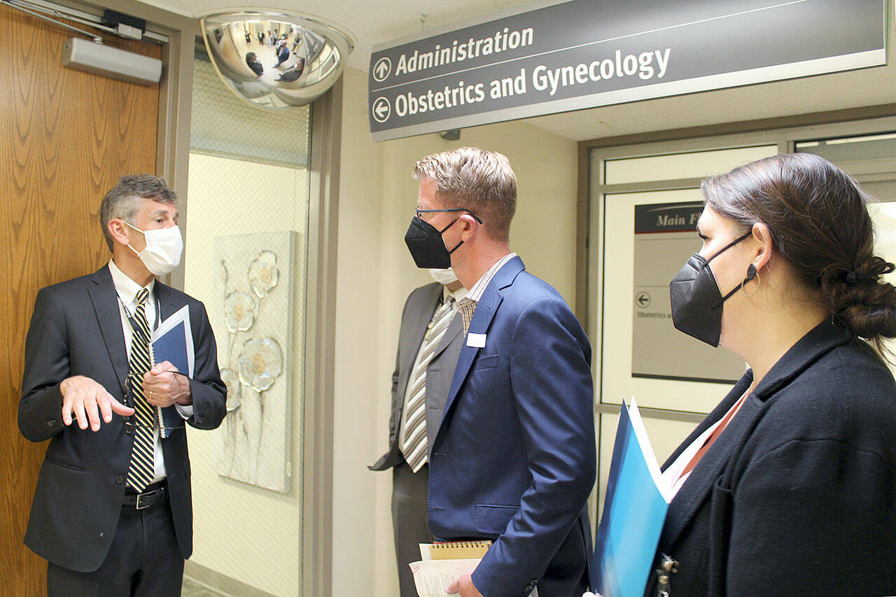 Jefferson Healthcare CEO Mike Glenn, left, speaks to U.S. Rep. Derek Kilmer, a Democrat representing the Olympic Peninsula, during a visit to the main hospital facility in Port Townsend on Wednesday. (Courtesy photo)