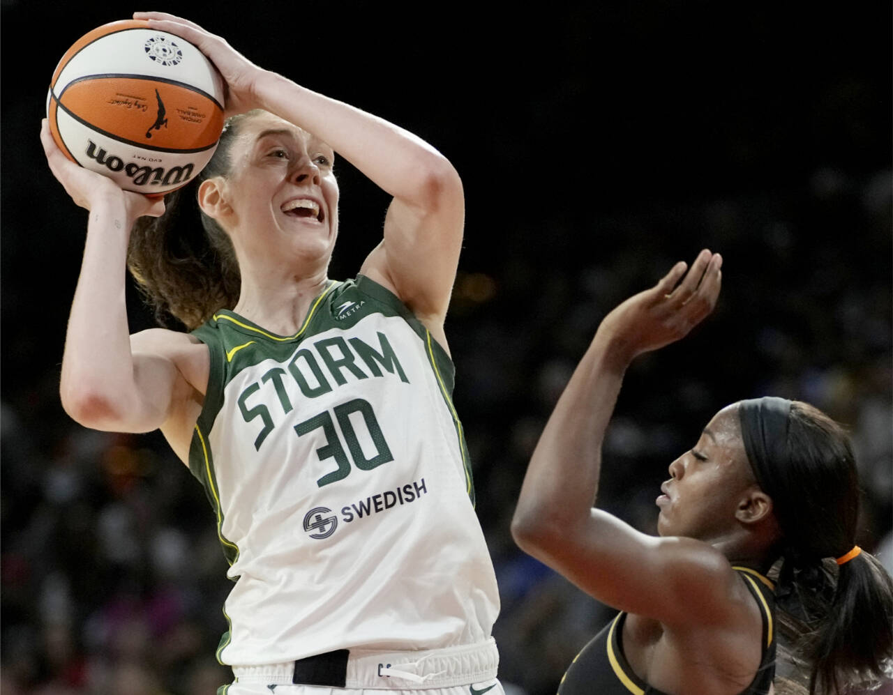 John Locher/The Associated Press
Seattle Storm forward Breanna Stewart (30) shoots against the Las Vegas Aces during the second half in Game 1 of a WNBA basketball semifinal playoff series Sunday, Aug. 28, 2022, in Las Vegas.