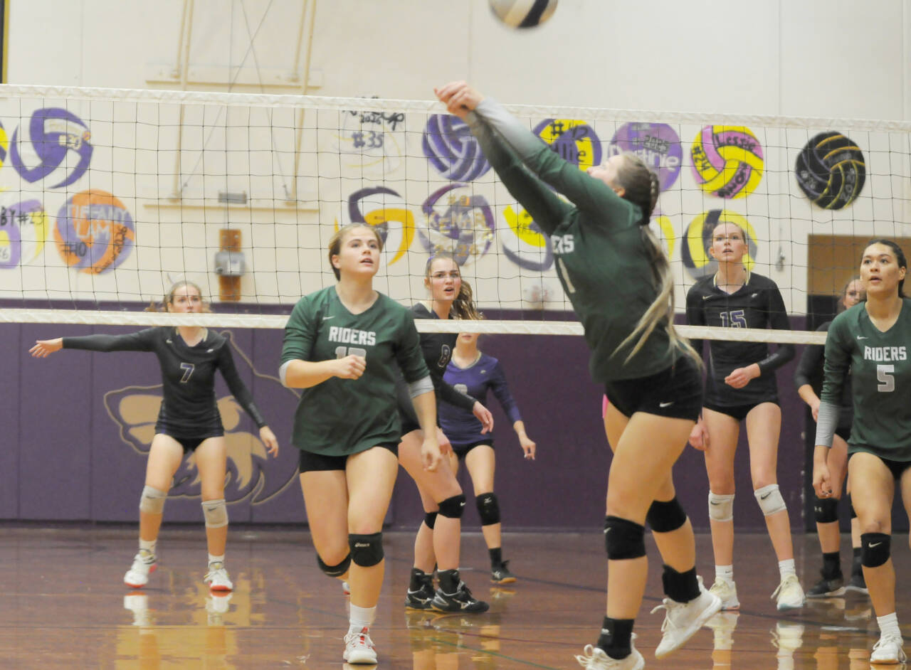 Port Angeles’ Jayde Wold (1) digs the ball during a volleyball match against Sequim on Tuesday. In on the play are Roughriders Lily Halberg (12) and Karma Williams (5) and Sequim’s Sydney Clark (7), Anna Cowan (8) and Kendall Hastings (15). (Michael Dashiell/Olympic Peninsula News Group)