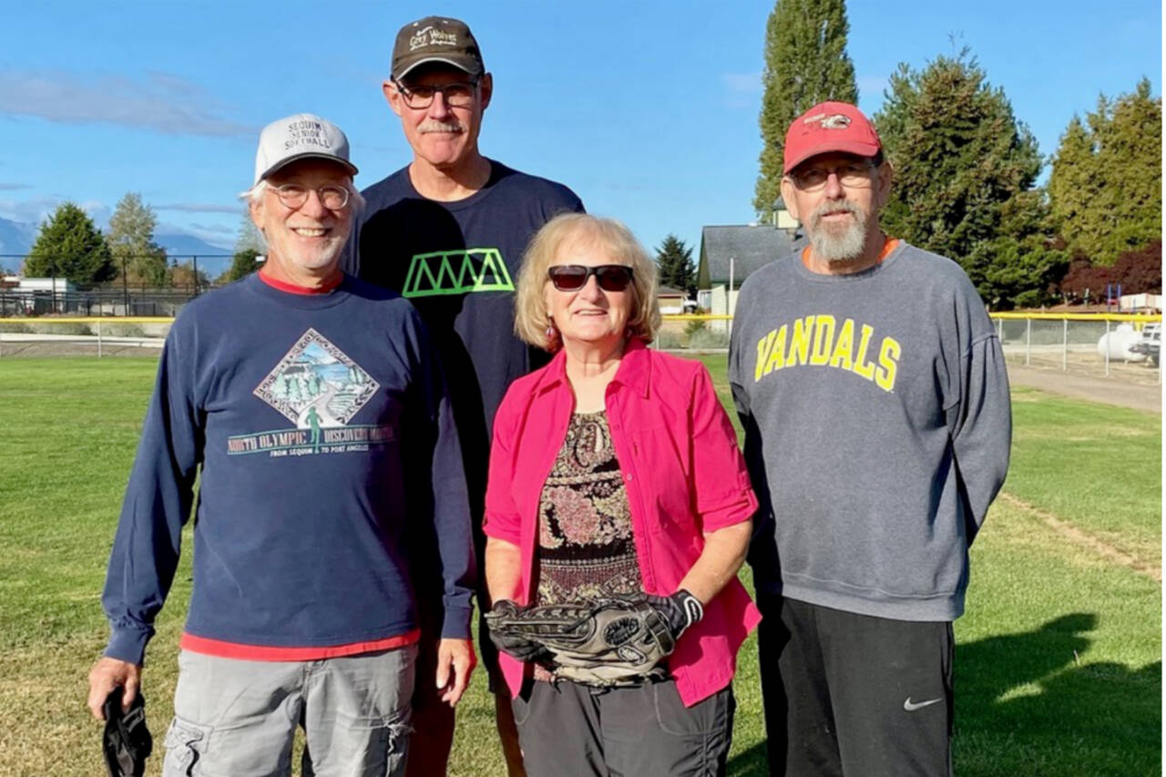 The newly elected officers of the Sequim Grey Wolves Softball Club. From left, Treasurer Joel Hecht, President John White, Secretary Annette Hanson and Vice President Lauren Scrafford. (Courtesy photo)