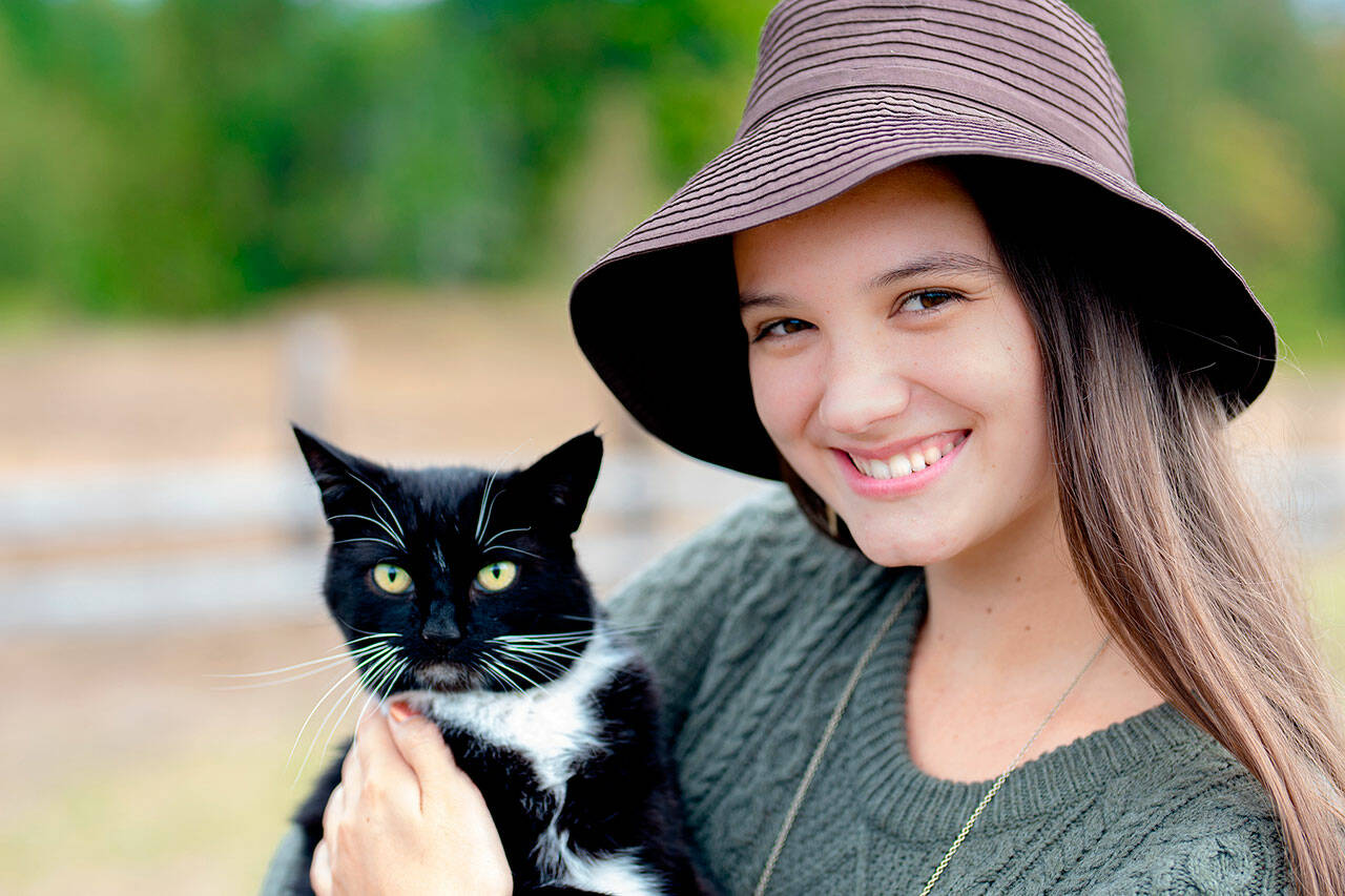 Melanie Byrne with Pickles the cat.