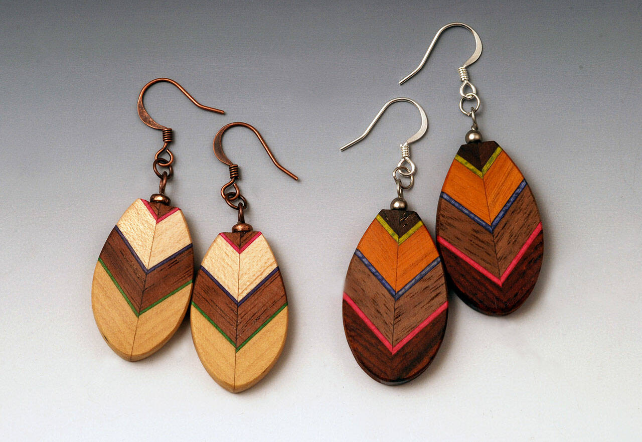 Martha Collins jewelry from wood is among pieces on view at Port Townsend Gallery.