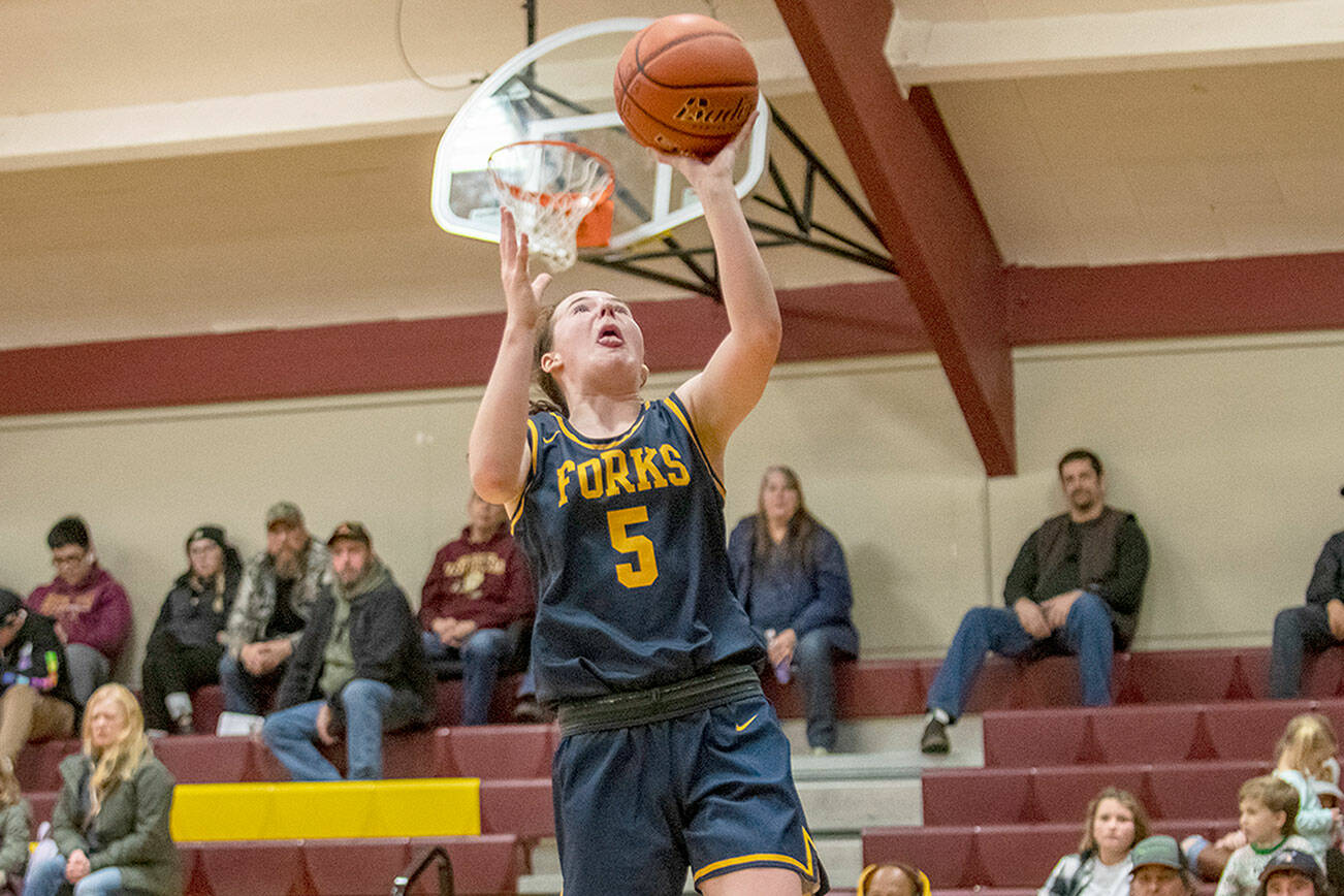 Courtesy Eric Trent
Forks' Keira Johnson skies for a layup during the Spartans' 74-25 win over South Bend on the road Friday night.