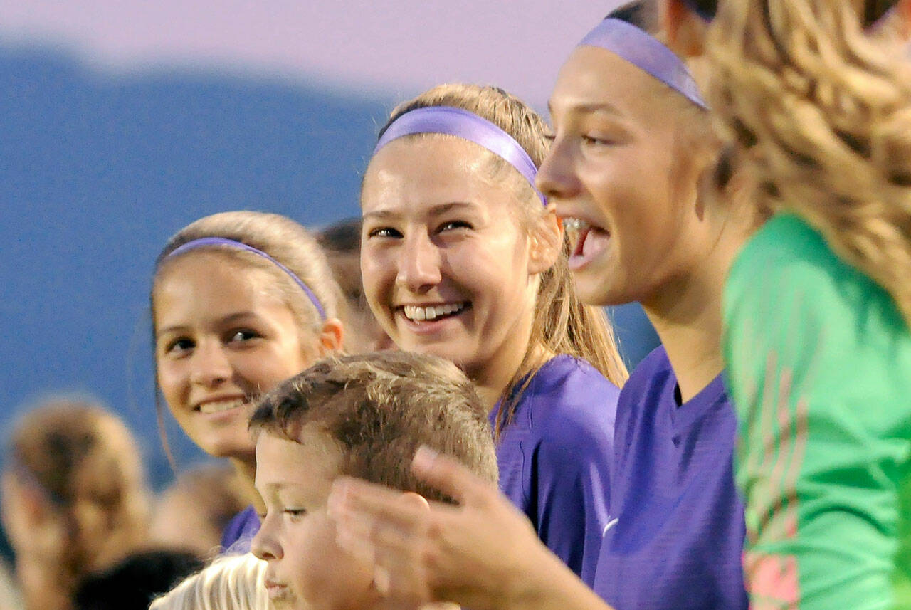 Sequim’s Taryn Johnson (center) set the Wolves’ all-time goal scoring record as a junior this season. Johnson is the Peninsula Daily News’ All-Peninsula Girls Soccer MVP. (Michael Dashiell/Olympic Peninsula News Group)