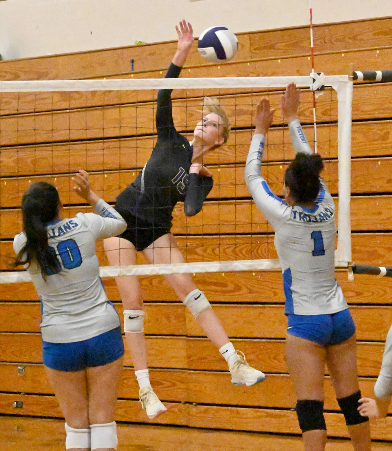 Michael Dashiell/Olympic Peninsula News Group Sequim’s Kendall Hastings spikes the ball against Olympic this season. Hastings led the Wolves with 15 kills a game.