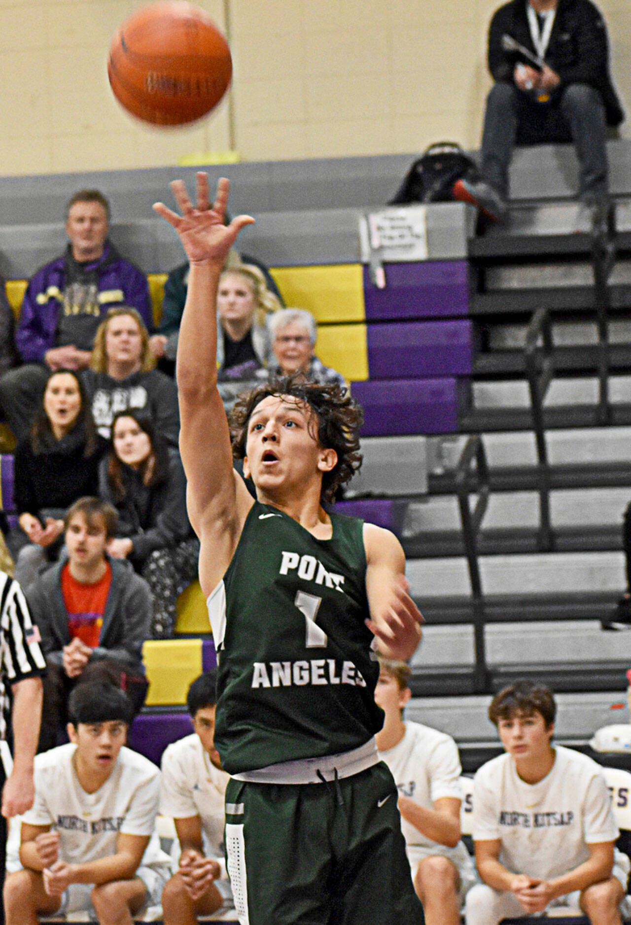 Port Angeles’ Kason Albaugh puts up a floater during the Roughriders’ 64-56 loss to the Vikings on the road Tuesday night. (Nicholas Zeller-Singh/North Kitsap Herald)