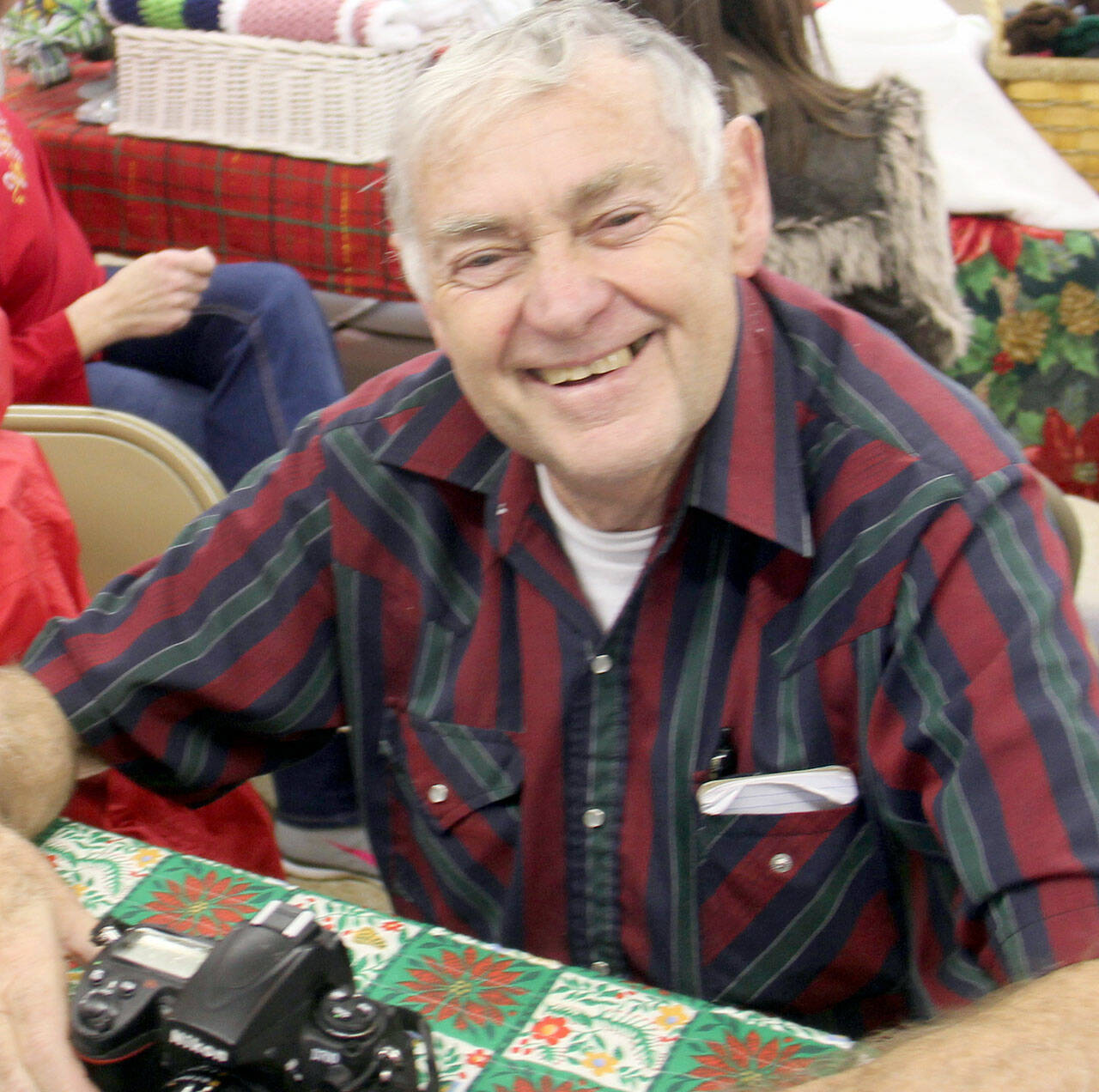 Lonnie Archibald, pictured at a book signing, is the author of a new book about Clallam County.