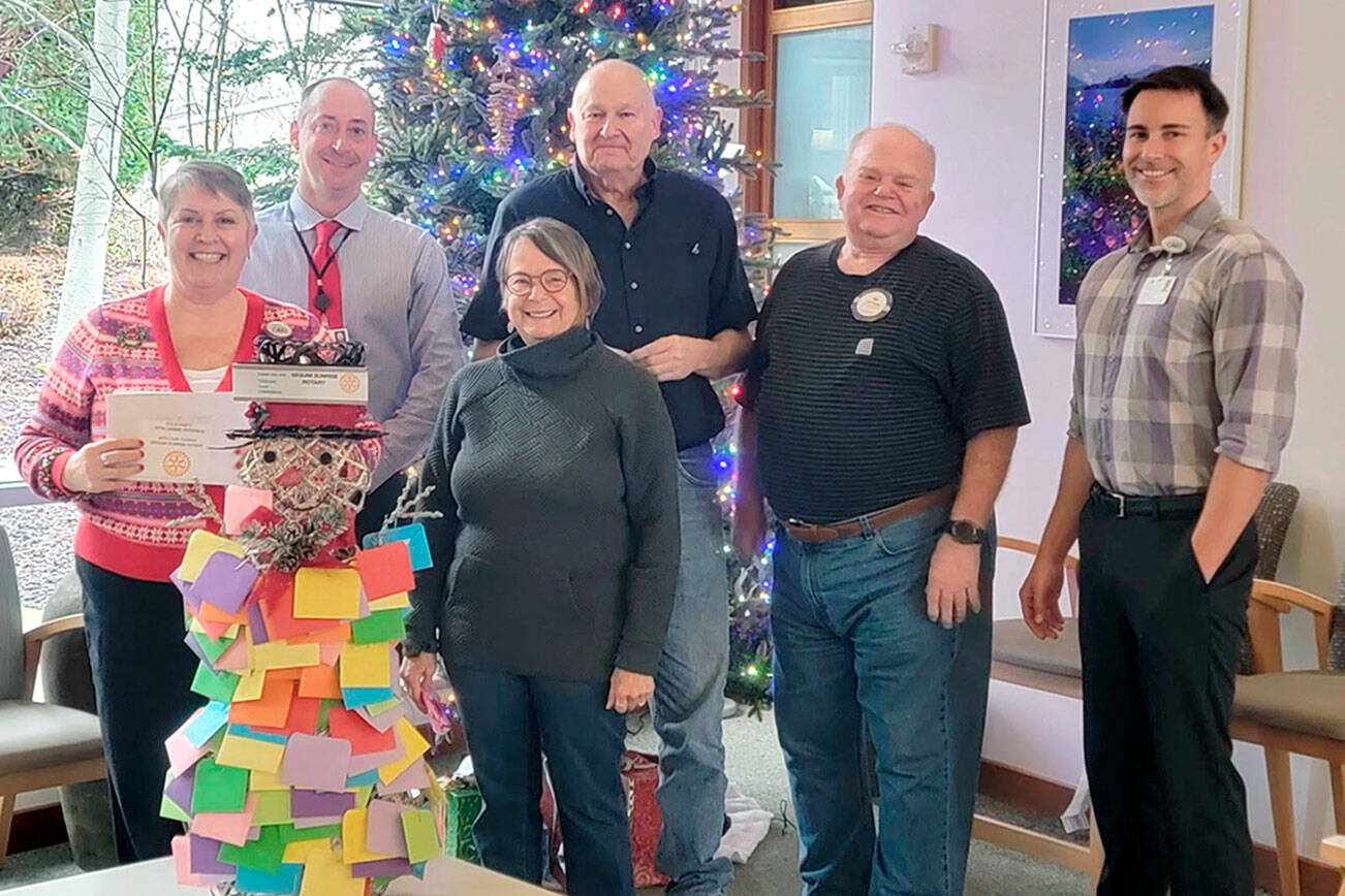 Pictured, from left to right are Shawn Gould, Mike Loucks, Debbie Peterson, Tom Hartig, Richard Suskind and Amala Kuster