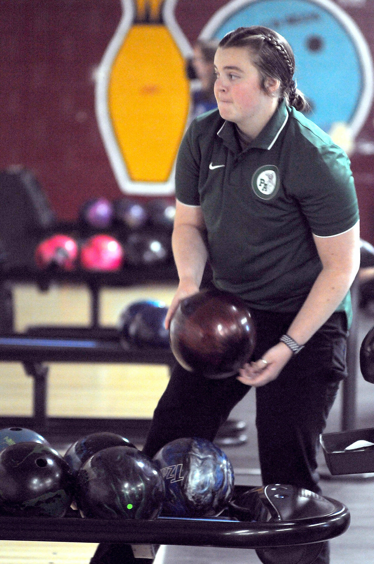 KEITH THORPE/PENINSULA DAILY NEWS Port Angeles team captain Taylor Worthington prepares to take her turn on the lane during Thursday’s four-way bowling tournament at Laurel Lanes in Port Angeles.