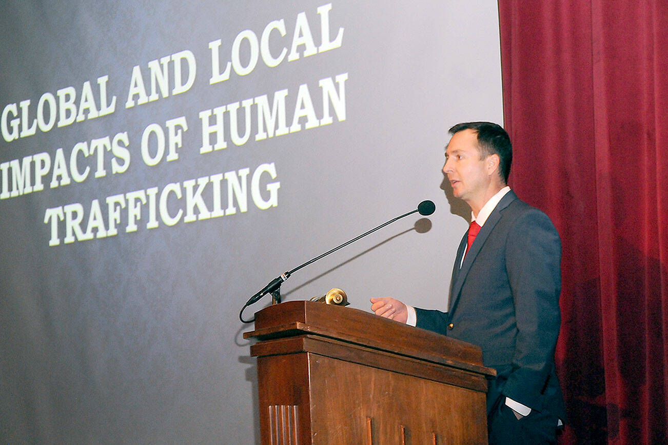 Clallam County Prosecuting Attorney Mark Nichols makes a presentation on the effects of human trafficking during Thursday’s Studium Generale on the Port Angeles campus of Peninsula College. (Keith Thorpe/Peninsula Daily News)