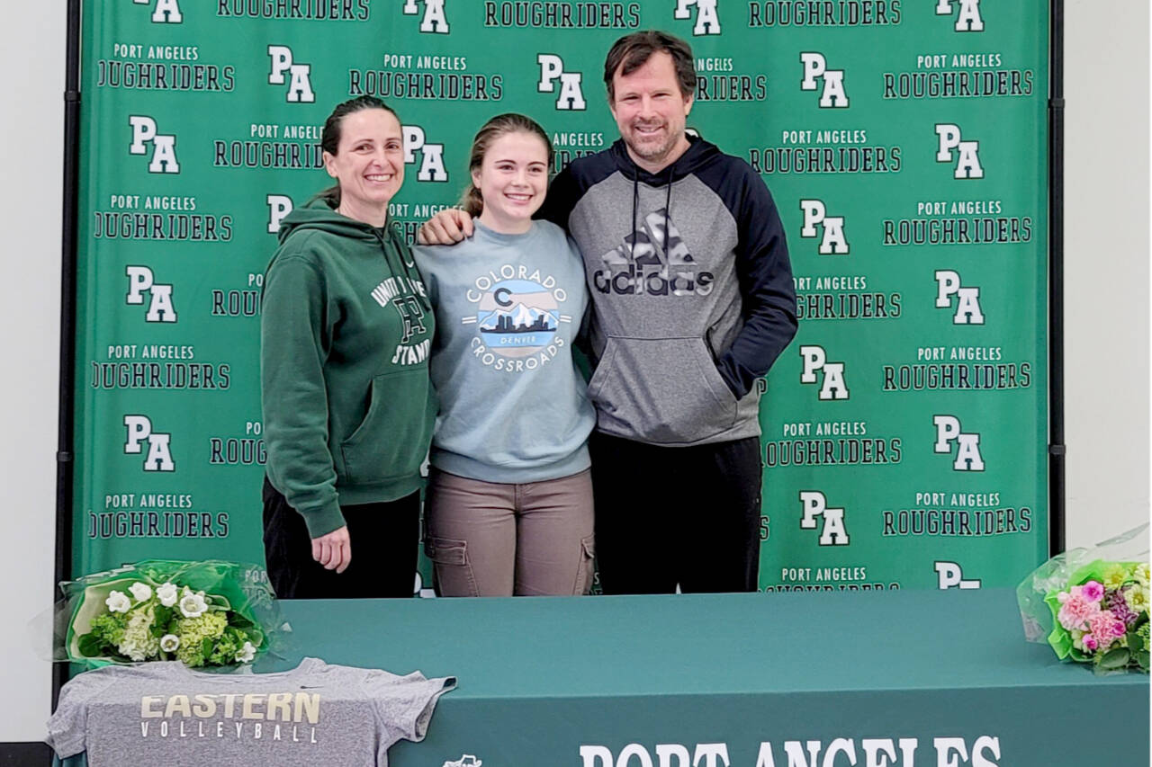 Port Angeles’ Lily Halberg signed a letter of intent last week to play volleyball at Eastern Oregon University in La Grande, Ore., last week. With her at her signing is her mother, Christine Grunch-Halberg and father Greg Halberg. (Courtesy photo)