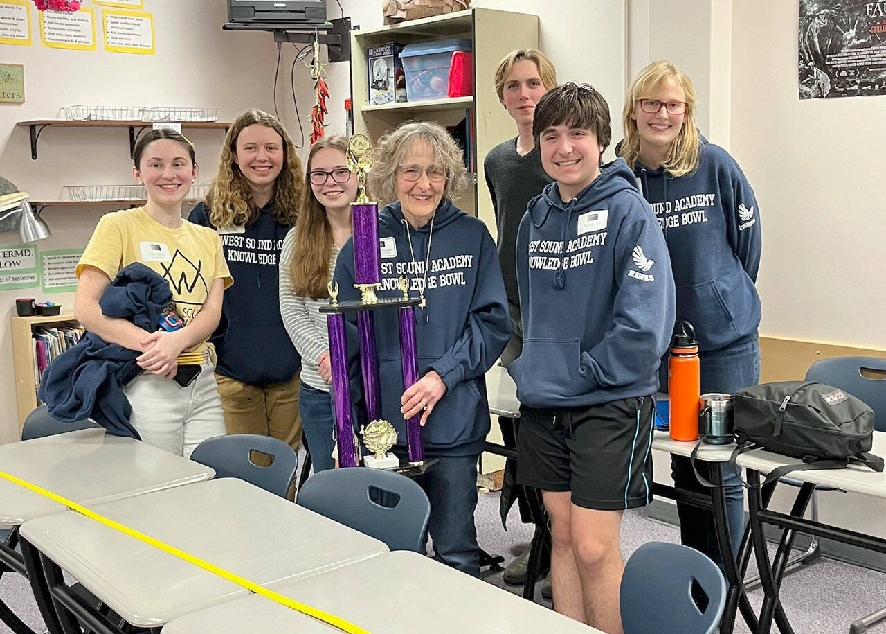 Pictured, left to right, are Lucy Schmitt, Zia Magill, Mia Lowell, Coach Susan Trower, Noah Holly, Andrew Corbo and Nadia Fisch.