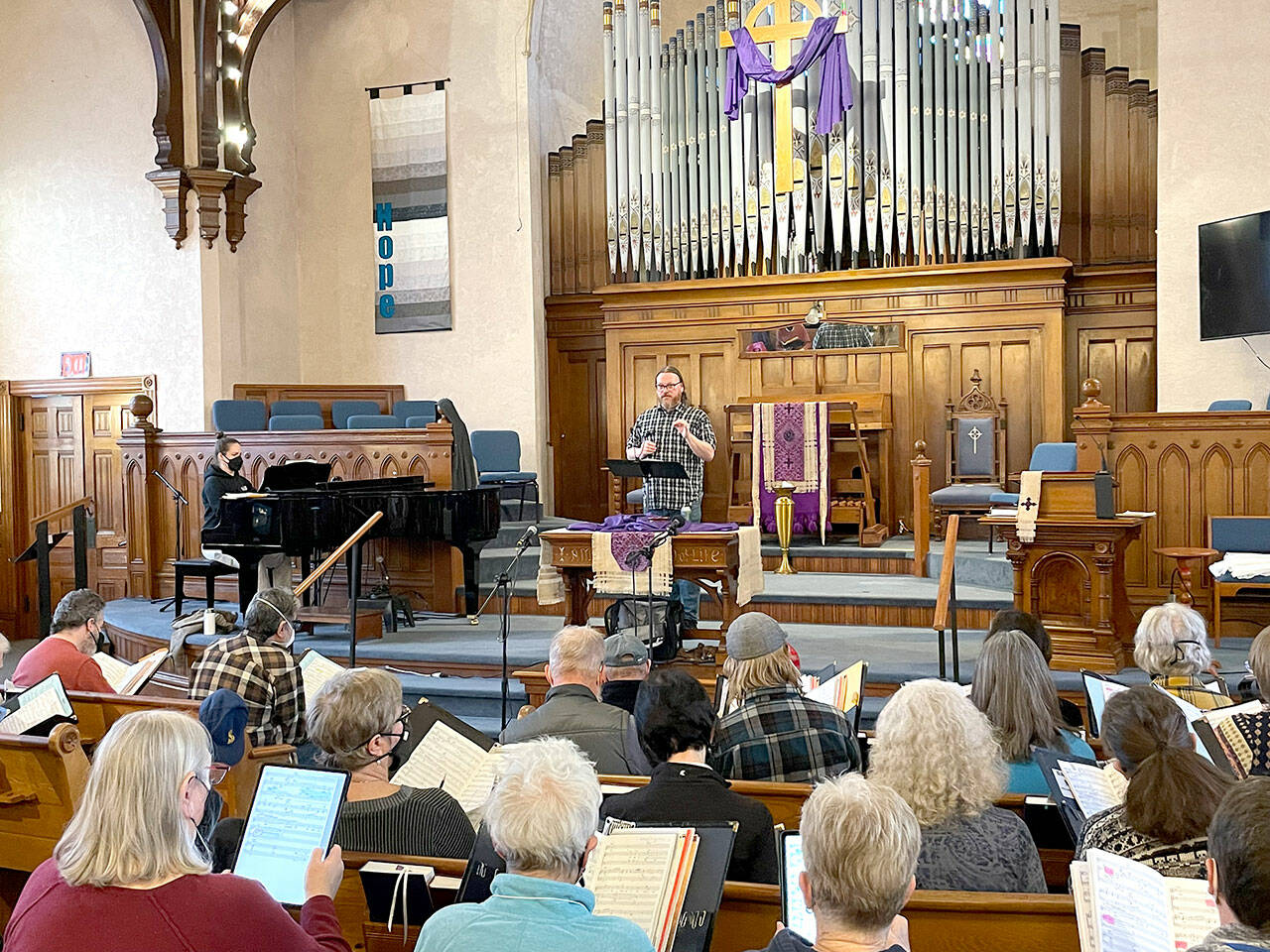 Spring director Jonathan Stafford rehearses the choir in preparation for spring Broadway concerts this weekend.