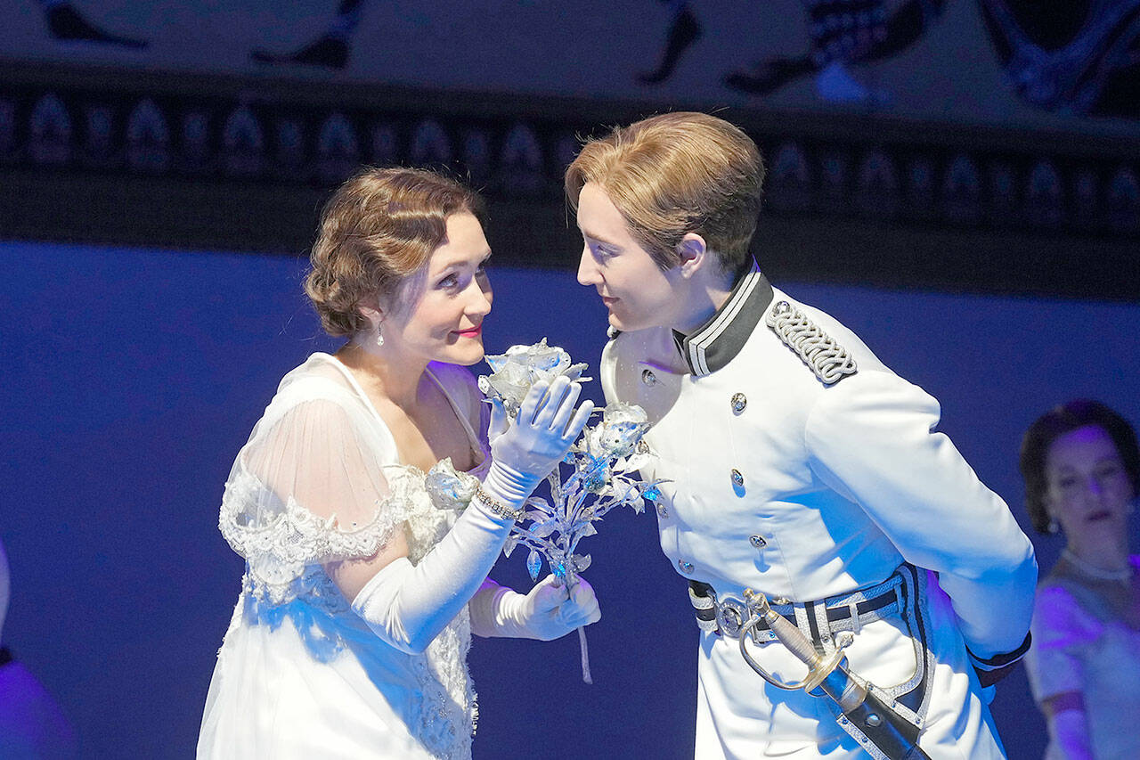 Octavian (Samantha Hankey), right, brings a silver engagement rose to Sophie (Erin Morley) in the Metropolitan Opera’s “Der Rosenkavalier.” The Met’s performance will be simulcast in Port Angeles live from New York City this Saturday. (photo by Ken Howard/Met Opera)