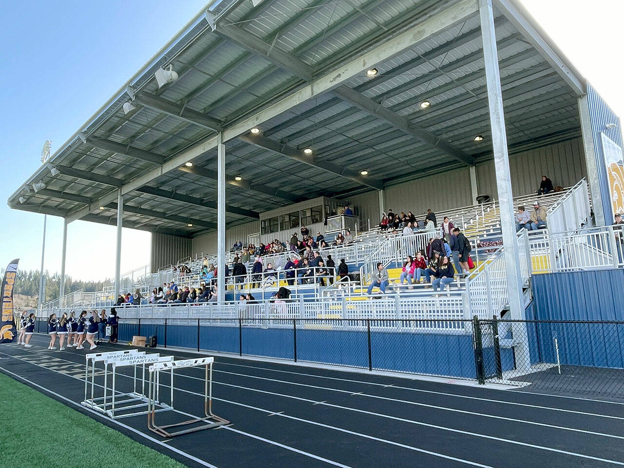 Quillayute Valley School District’s new Spartan Stadium was officially opened with a grand opening ceremony that honored the school board, building committee members and long-serving volunteers. (Paula Hunt/Peninsula Daily News)