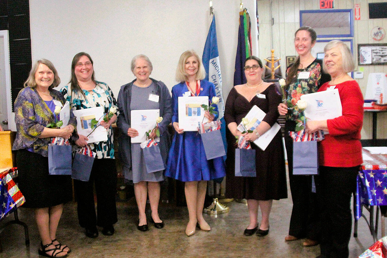 Pictured, from left to right, are new members Lynne Petitjean, Jennifer De Cou, Grace Kauffman, Cherie Kidd, Gwynn Oden, Amanda Patterson, and Ilene Rogers.

PHOTO BY Darlene Cook/Michael Trebert Chapter, DAR