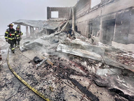 Firefighters from Clallam 2 Fire-Rescue and the Port Angeles Fire Department responded Sunday afternoon to a fire at the Olympic National Park Day Lodge. The building was a total loss and still was burning Monday morning. (Clallam County Fire District 2)