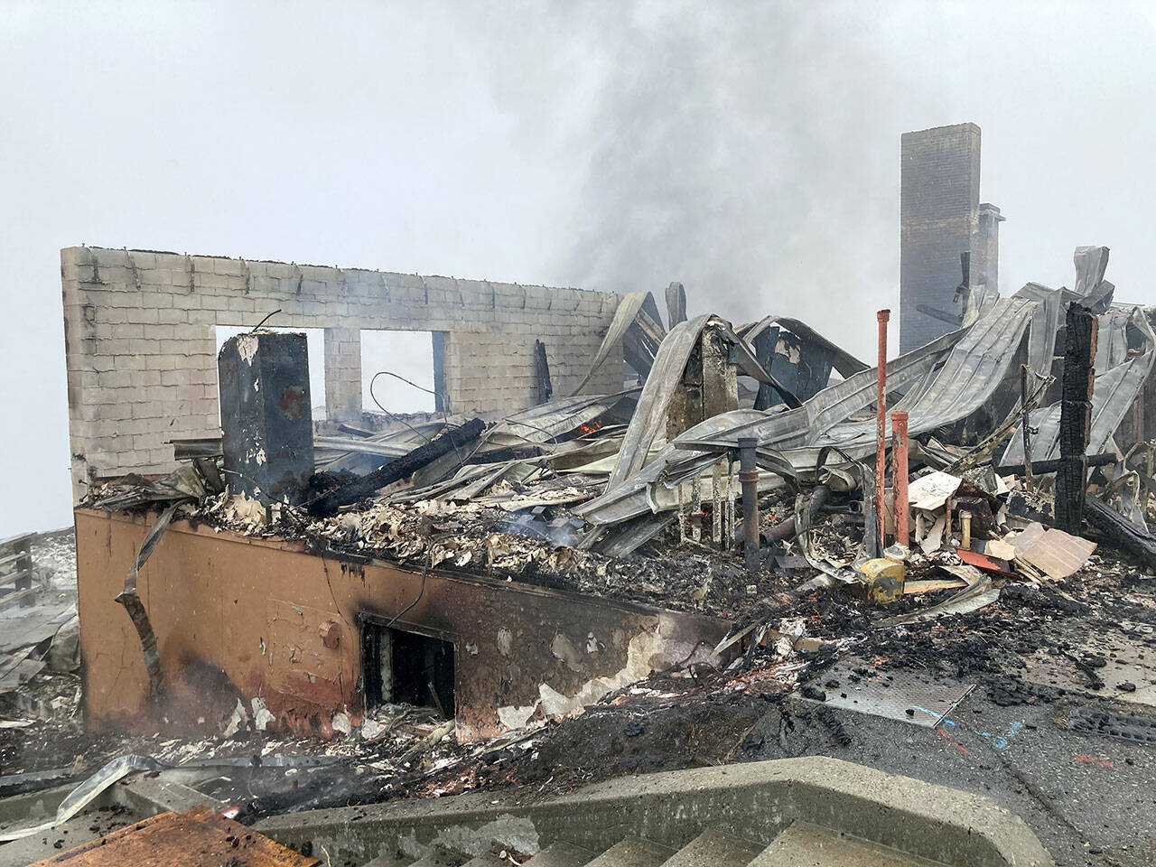 The remains of Hurricane Ridge Day Lodge were to be examined by fire investigators. (National Park Service)