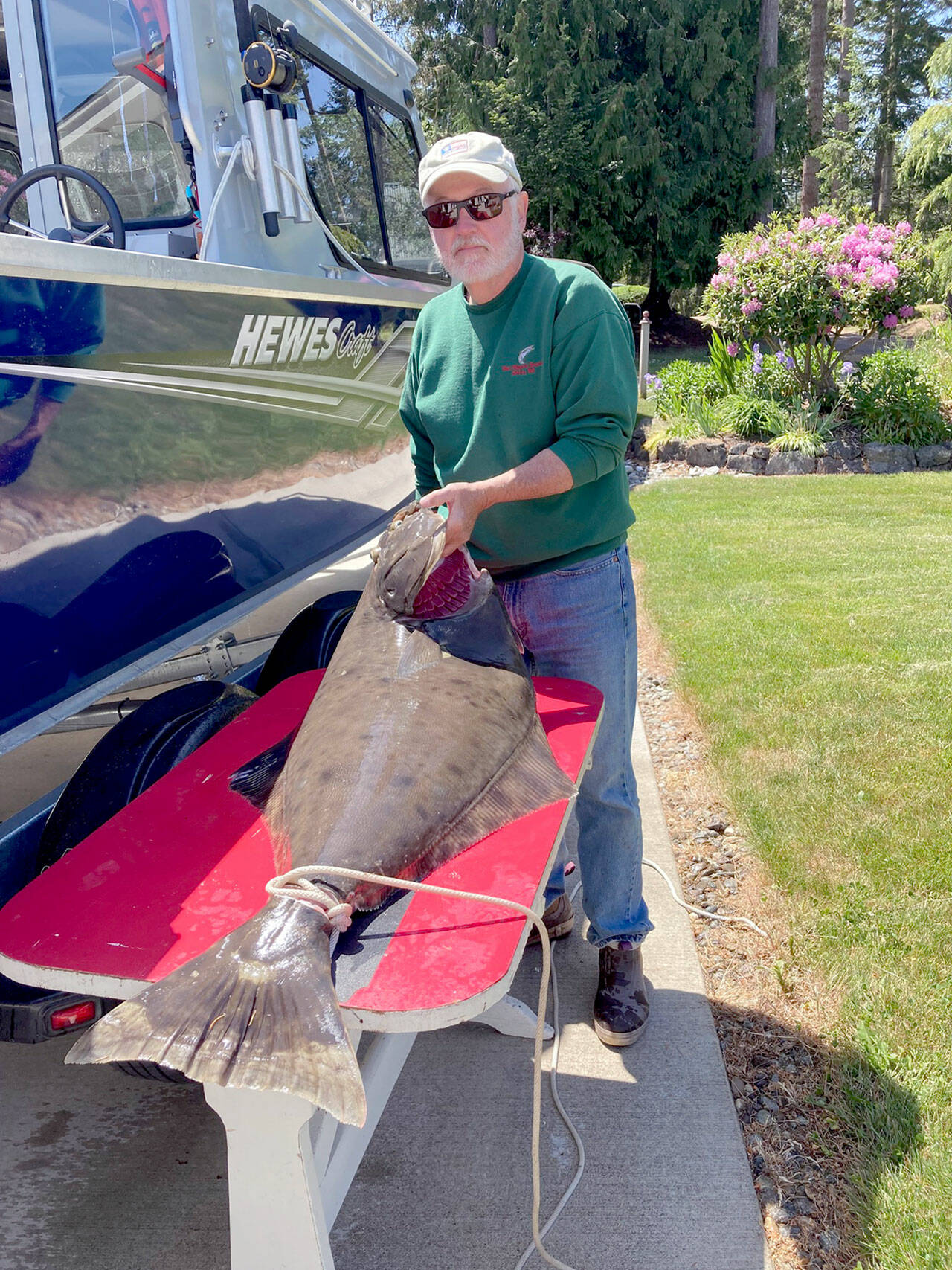 Sequim’s Don Early said he caught this nice halibut within 30 minutes of hitting the water off Port Angeles over the weekend.