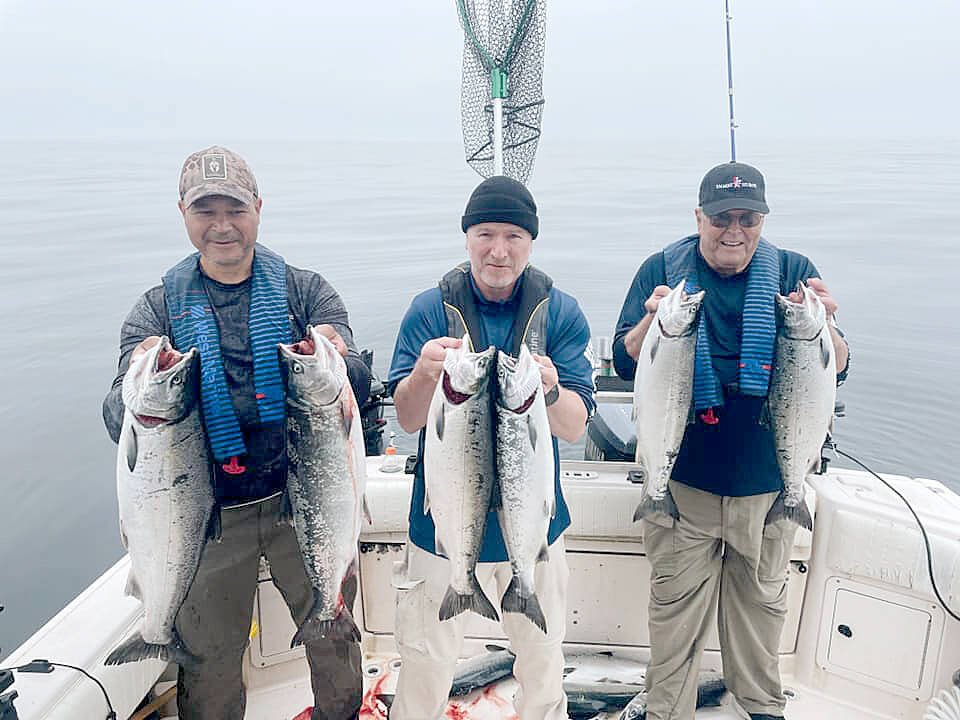 Submitted photo
The NW Region of Salmon For Soldiers is seeking boat captains to take veterans out on the water for the annual Sekiu Summer Slam salmon fishing outing on Aug. 5. These vets found success during the event in August of 2021.