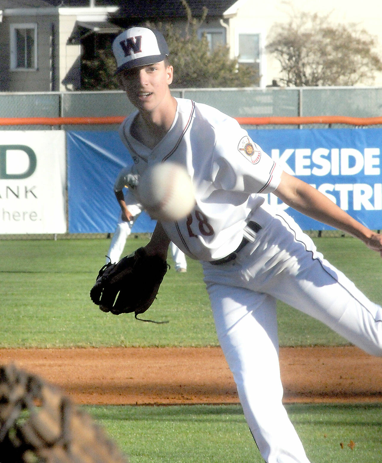 KEITH THORPE/PENINSULA DAILY NEWS Wilder Senior pitcher Rylan Politika throws in the first inning against Shoreline Royals on Thursday evening at Port Angeles Civic Field.