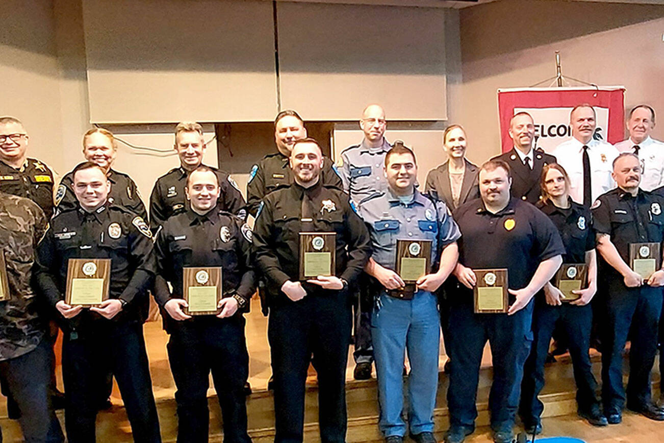 Pictured in the front row, from left to right, are awardees Jodi Simmons, Deputy Owen McCann, Officer Taran Johnson, Officer Kyle Buchanan, Officer Cody Hesler, Trooper Lynden Schwilke, Sgt. Tanner House, Firefighter/Paramedic Trainee Elizabeth Hagaman, Captain Marty Martinez, EMT Brandan Tucker, Lt. David Benzick and Gene Mattson 

In the back row, from left to right are Sandra Strafford and agency representatives Susan Craig, Sheriff Brian King, Sgt. Carolee Edwards, Chief Brian Smith, Chief Sam White, Trooper Eric Ellefson, Superintendent Jeri Boe, Chief Derrell Sharpe, Chief Jake Patterson, Chief Dan Orr and Chief Greg Waters.