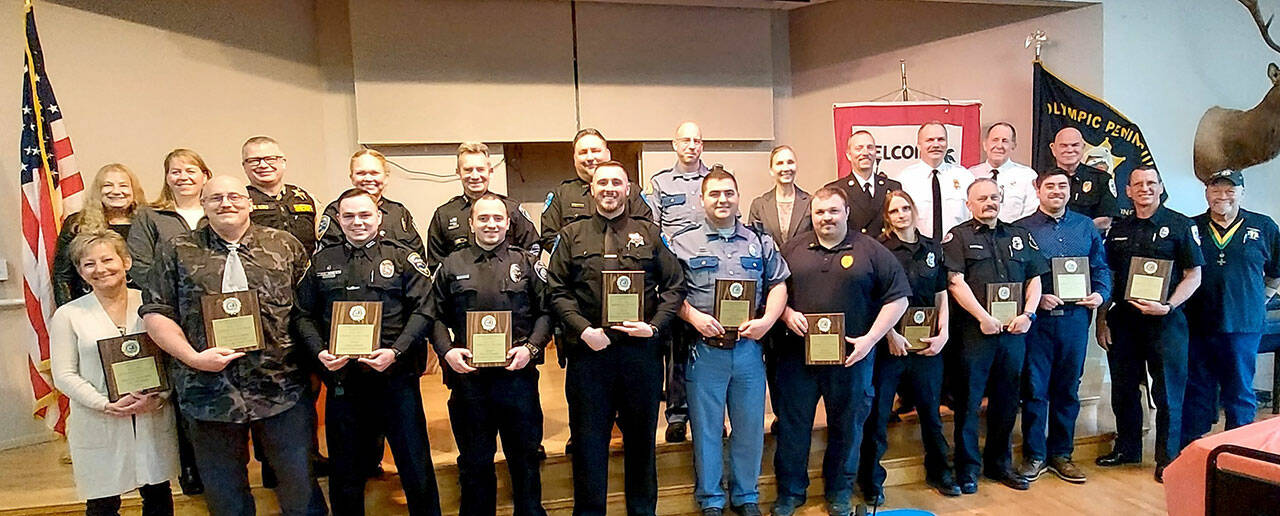 Pictured in the front row, left to right, are awardees Jodi Simmons, Deputy Owen McCann, Officer Taran Johnson, Officer Kyle Buchanan, Officer Cody Hesler, Trooper Lynden Schwilke, Sgt. Tanner House, Firefighter/Paramedic Trainee Elizabeth Hagaman, Captain Marty Martinez, EMT Brandan Tucker, Lt. David Benzick and Gene Mattson In the back row, left to right are Sandra Strafford and agency representatives Susan Craig, Sheriff Brian King, Sgt. Carolee Edwards, Chief Brian Smith, Chief Sam White, Trooper Eric Ellefson, Superintendent Jeri Boe, Chief Derrell Sharpe, Chief Jake Patterson, Chief Dan Orr and Chief Greg Waters.