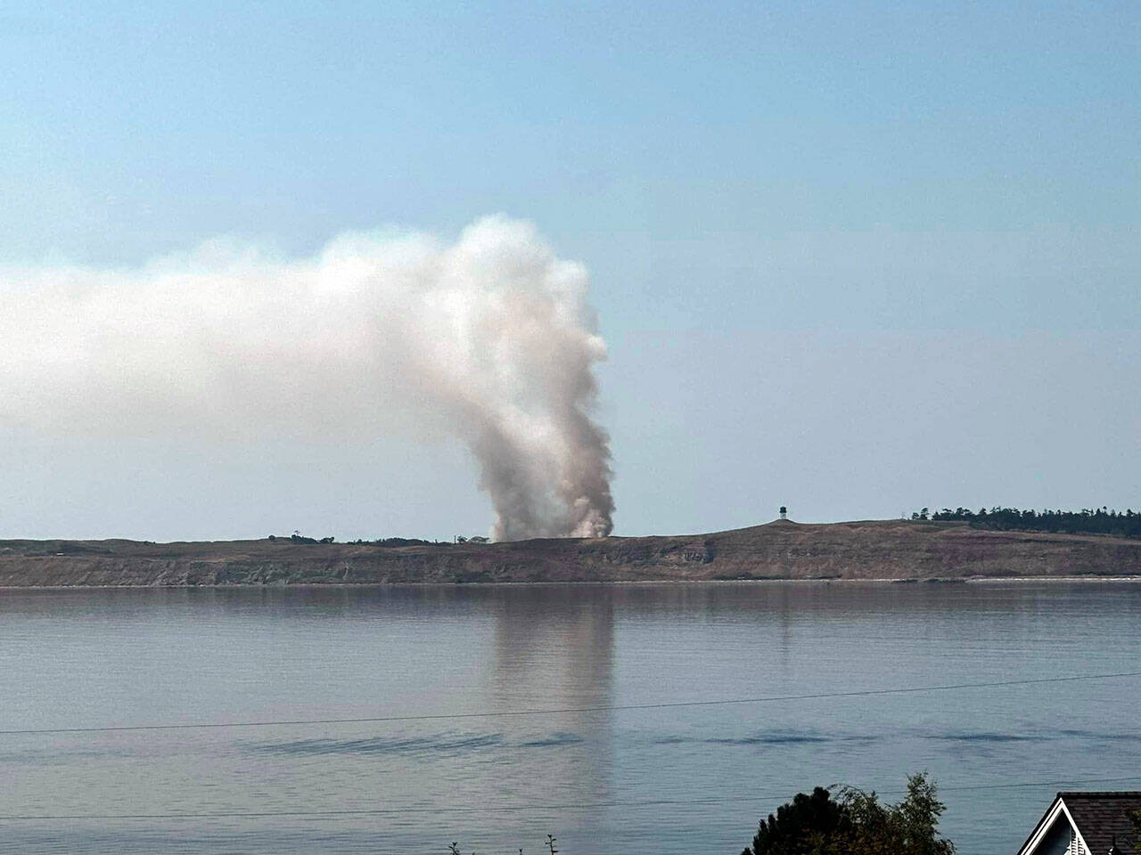 A view of Protection Island from East Jefferson County shows smoke from the fire that broke out on Wednesday. (Jefferson County Sheriff’s Office)