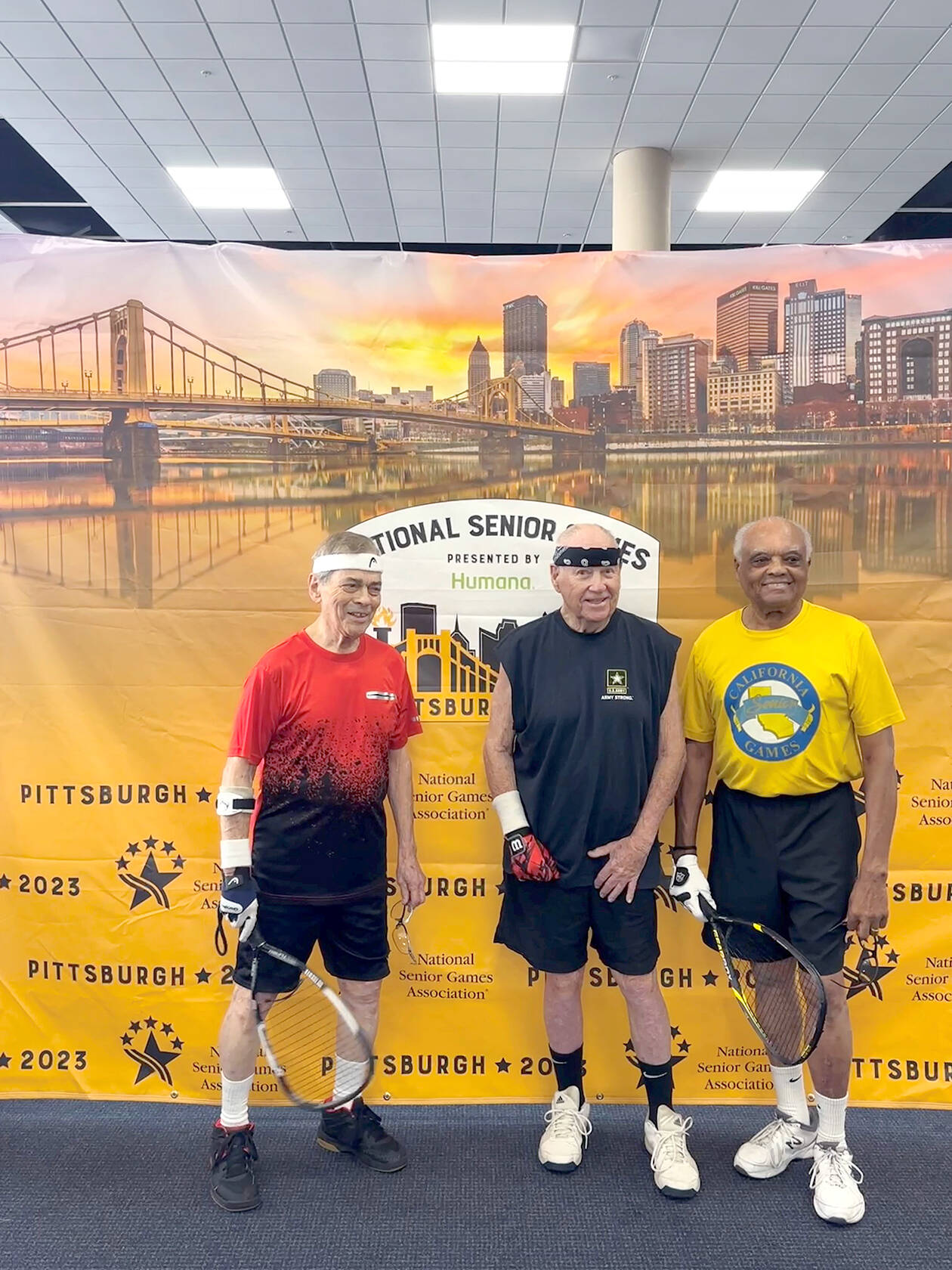 Gerald Rettela, age 88 of Port Angeles (center), won bronze in racquetball men’s singles and silver in men’s doubles in the 85-89 age group at the National Senior Games in Pittsburgh. He is joined by singles silver medalist Charles Herrera, left, and gold medalist Eugene Bailey.