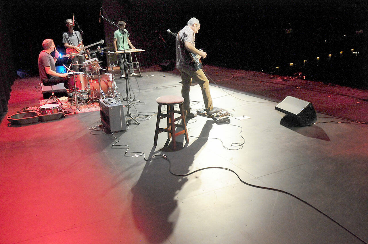 The surf/rock band Ant Bath, from left, Clay Murdach, Brennan Van Blair, Cass Grattan and Phil Zarelli, perform on Saturday at Field Arts & Events Hall in Port Angeles during the venue’s Community Days celebration. The two-day event featured a slate of free amplified and acoustic performances by Olympic Peninsula performers as a way of introducing Field Hall to the public. (Keith Thorpe/Peninsula Daily News)