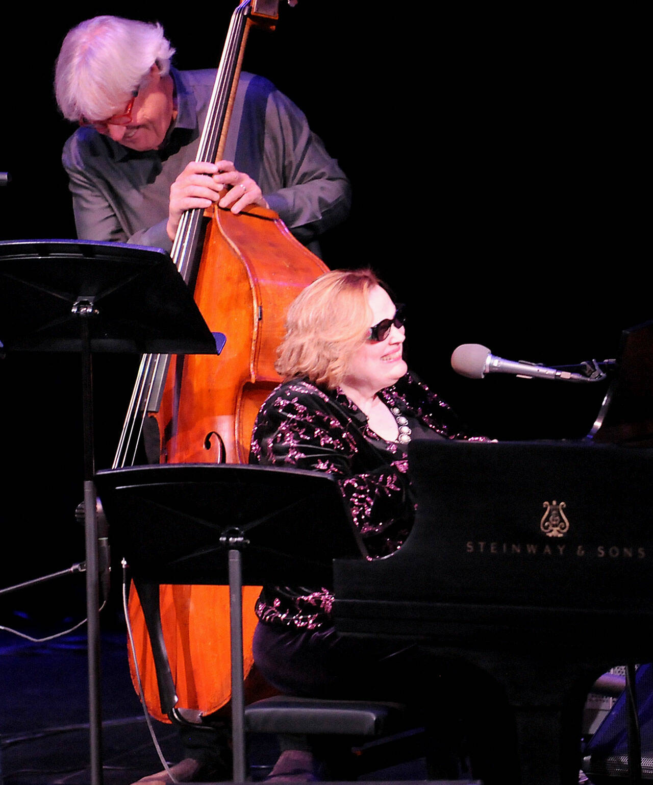 American jazz singer Diane “Deedles” Schuur, front, along with bassist Bruce Phares, perform in the Donna M. Morris Theater at the Field Arts & Events Hall in Port Angeles during Friday night’s opening weekend show. (Keith Thorpe/Peninsula Daily News)