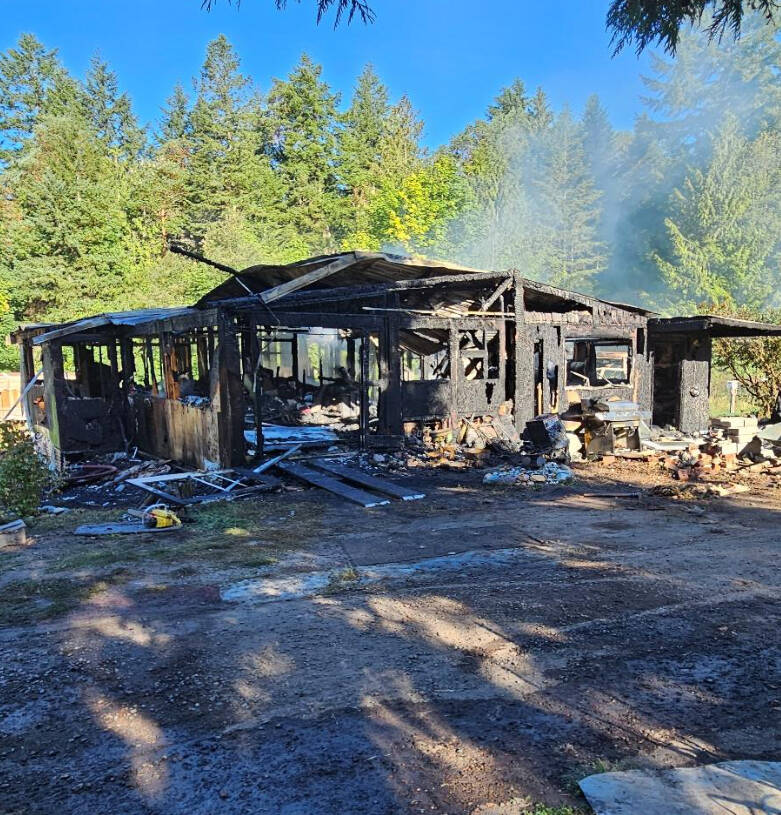 A deceased male was found inside a structure fire on the 300 block of Blue Grouse Lane near East Sequim Bay early Wednesday. (Clallam County Sheriff’s Office)