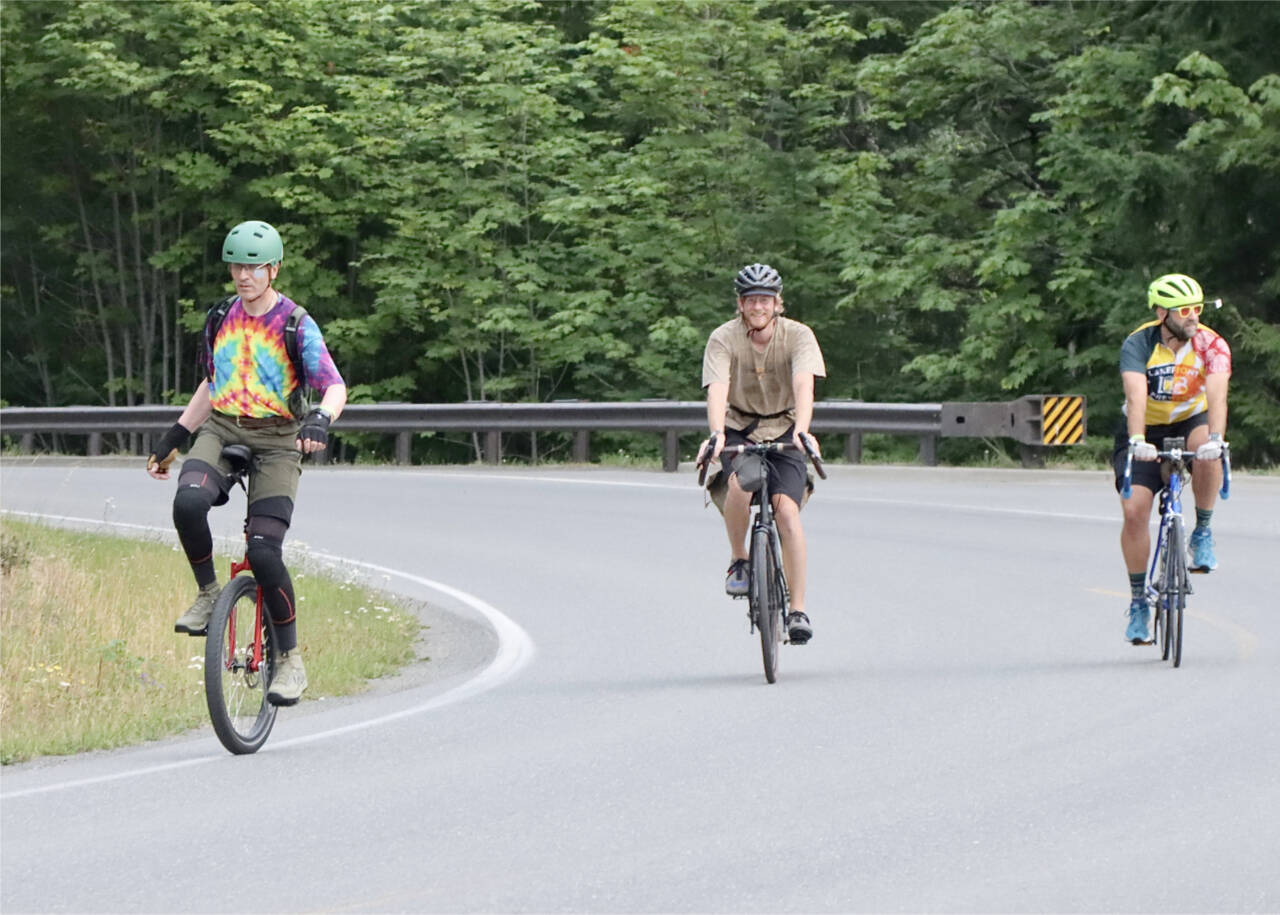 More than 900 cyclists from the U.S. and Canada took on the Ride the Hurricane Challenge up Hurricane Ridge Road on Sunday morning, including unicyclist Chris Hoy. (Dave Logan/for Peninsula Daily News)