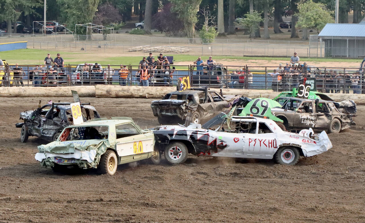 The demolition derby was the last event Sunday of the Clallam County Fair in Port Angeles and lived up to expectations with large crowds watching cars smashing into each other in several divisions. (Dave Logan/for Peninsula Daily News)