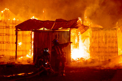 Firefighters respond to a blaze in the 600 block of Lower Elwha Road early Sunday morning. (Jay Cline/Clallam 2 Fire-Rescue)