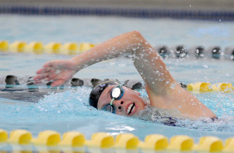 Sequim’s Annie Ellefson competes in the 100-yard freestyle relay during the Wolves’ 86-75 win over East Jefferson on Wednesday at the YMCA of Sequim. (Michael Dashiell/Olympic Peninsula News Group)