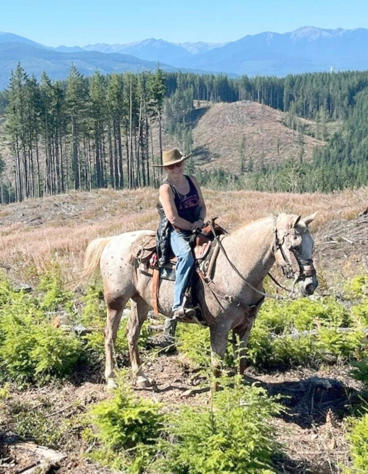 Prize ride participant Yvonne Degrassi Craig at one of the trail’s viewpoints. (Photo by Judy Depree)