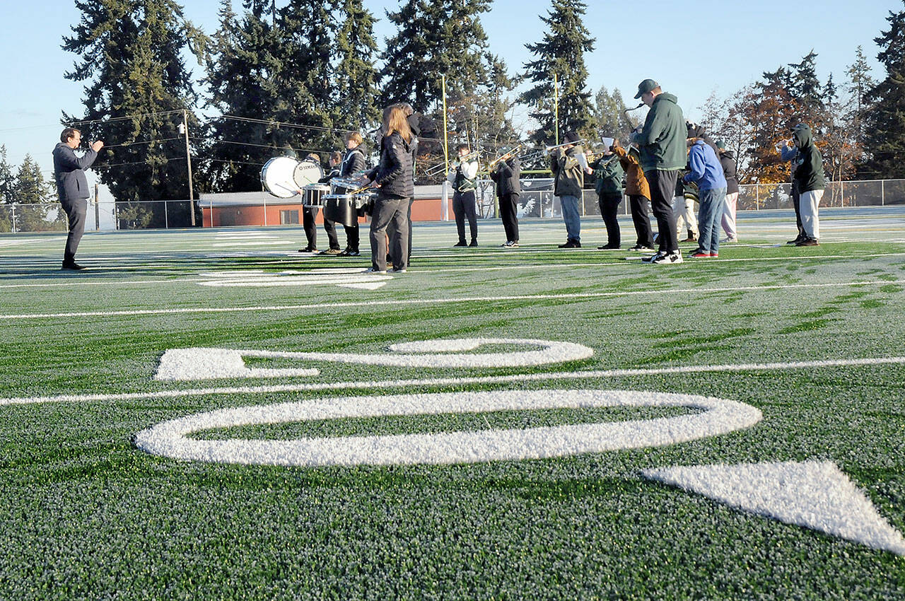 Members of the Port Angeles High School Band perform on the new pitch during Saturday’s dedication ceremony for the Port Angeles School District’s Monroe Athletic Field. (Keith Thorpe/Peninsula Daily News)