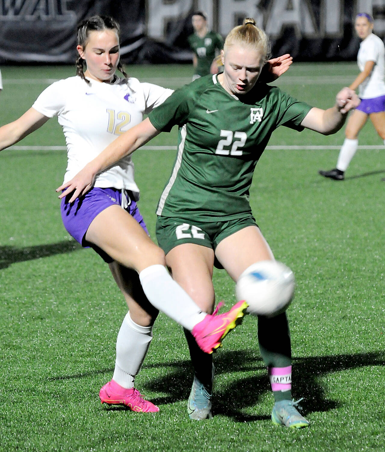 Sequim’s Olive Bridge, left, was named to the Olympic League second team for girls soccer, the only freshman to make either the first or second team. Port Angeles’ Paige Mason (22), who led the team with 12 goals, was named to the league’s first team. (Keith Thorpe/Peninsula Daily News)