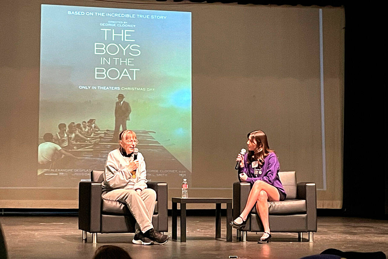 Judy Willman, the daughter of Joe Rantz, is interviewed by Danika Chen, a 2023 Sequim graduate, in the Sequim High School Auditorium on Friday about elements of “The Boys in the Boat” film and how her father is portrayed. Willman said her dad would not want attention but would be OK with it if it supported causes such as restoring the historic ASUW Shell House and building a homeless youth house in Sequim. (Matthew Nash/Olympic Peninsula News Group)