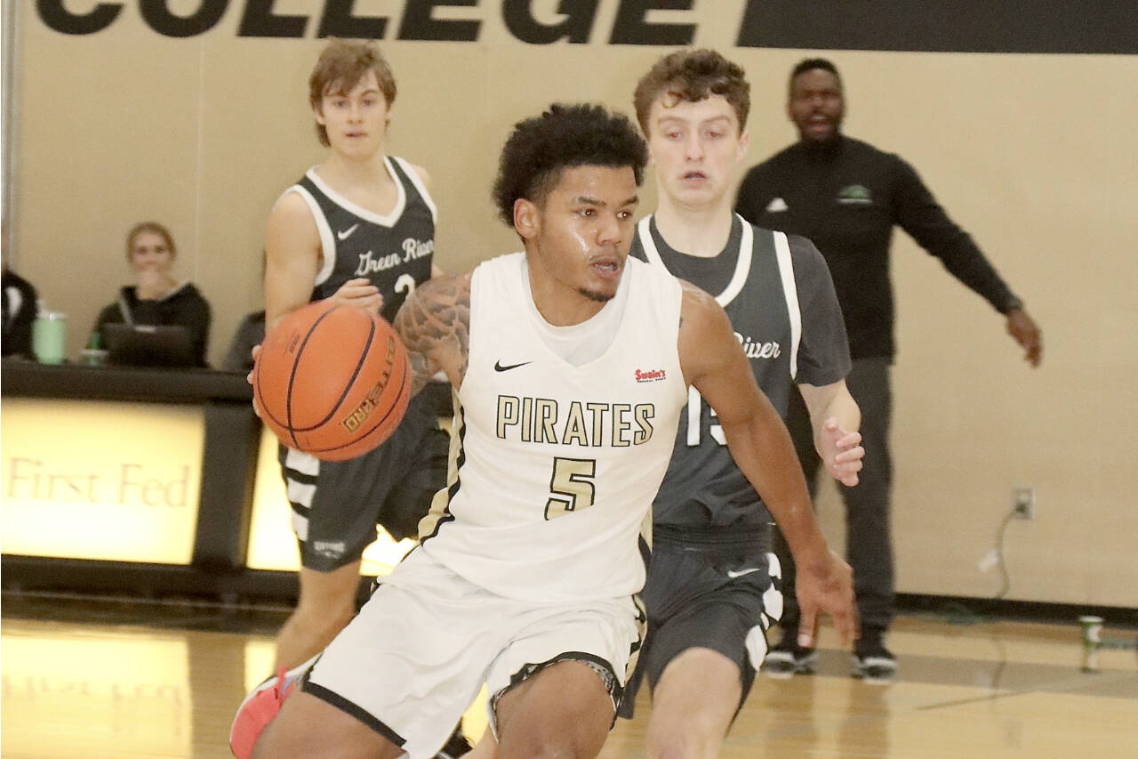 Peninsula College’s Javon Ervin (5) drives the ball against Green River on Saturday in Port Angeles. Green River won 78-58. (Dave Logan/for Peninsula Daily News)