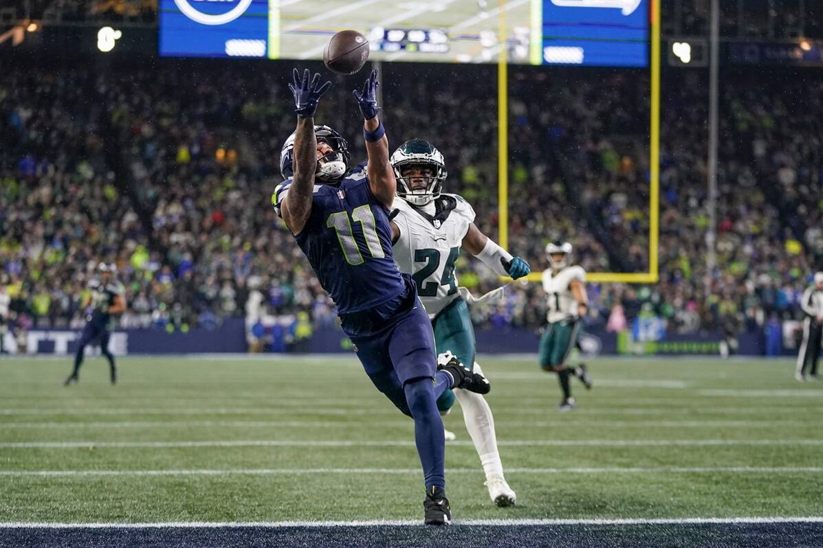 Seattle Seahawks wide receiver Jaxon Smith-Njigba (11) makes a touchdown catch in front of Philadelphia Eagles cornerback James Bradberry (24) in the final 28 seconds Monday in Seattle. The Seahawks won 20-17. (AP Photo/Lindsey Wasson)