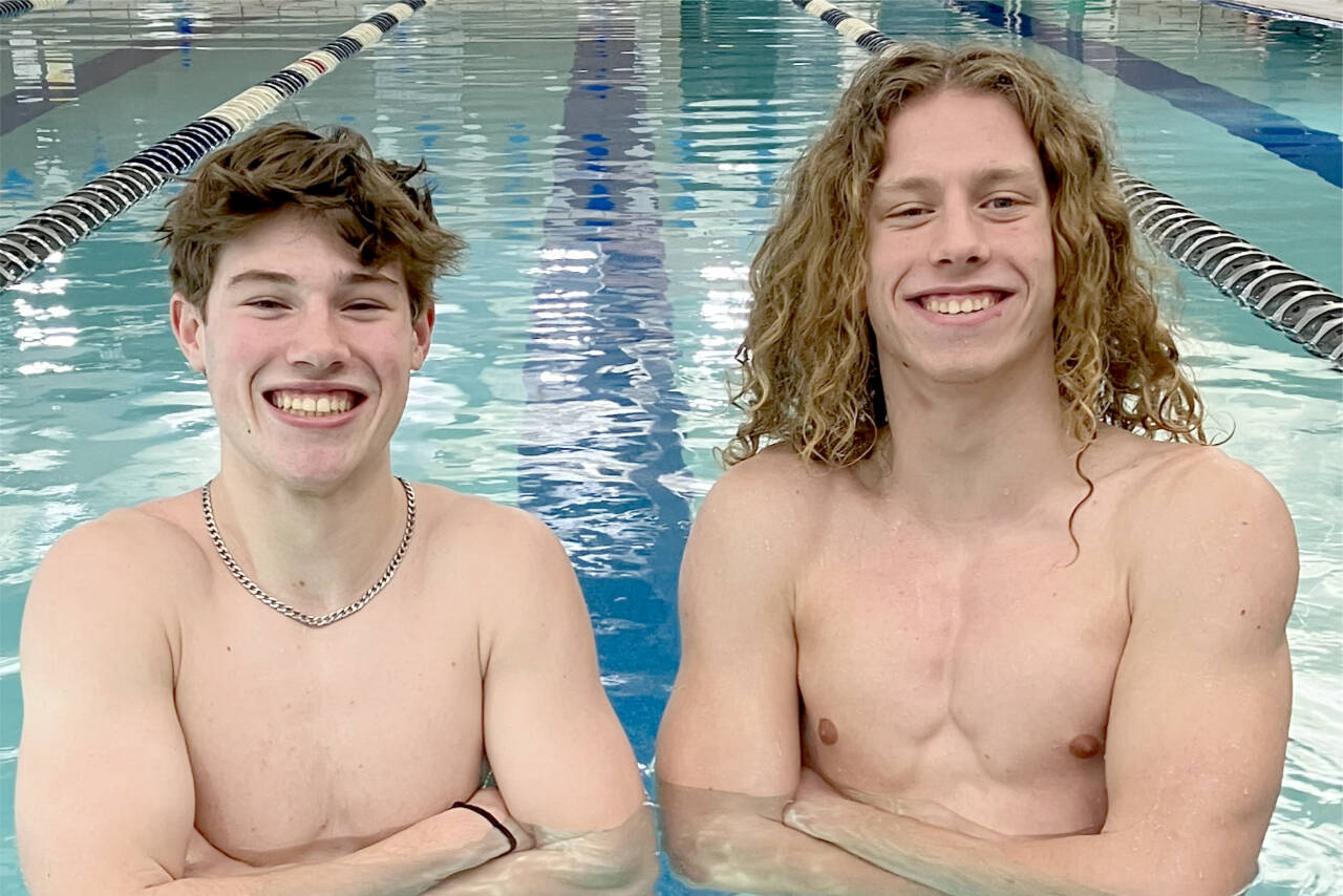 From left, Finn Thompson and Colby Ellefson, members of the Port Angeles boys swim team.