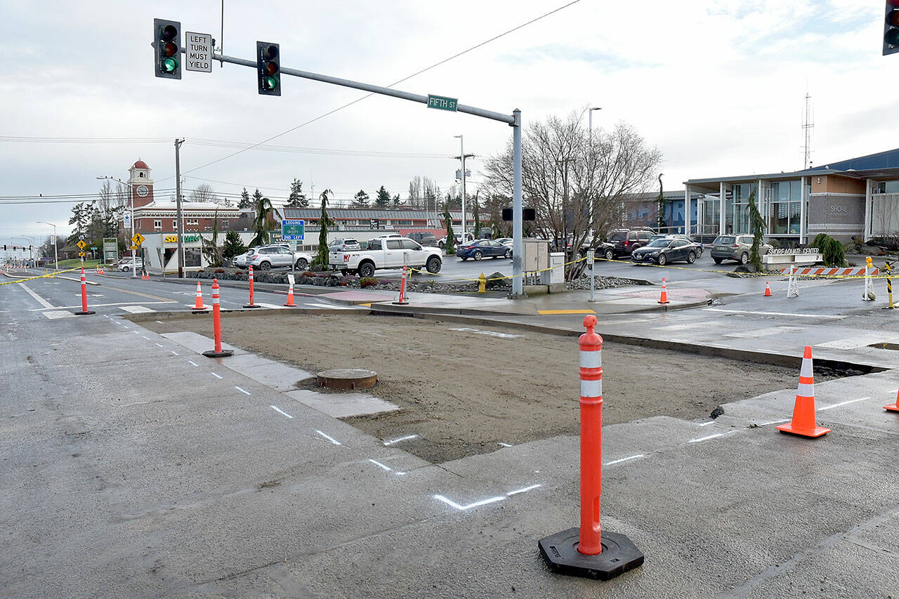 The paving work planned for Thursday at the intersection of Fifth and Lincoln streets has been delayed until today, Port Angeles Public Works Director Mike Healy said early Thursday afternoon. “The stabilizing material didn’t stabilize as well as it should, probably because of the rain and temperatures. About 20 percent isn’t as firm as we would like,” he said. “If you pave that, there will be a soft spot and we don’t want that. We have a lot of confidence that it will be ready Friday sometime around evening rush hour. Who knows? We hope Mother Nature cooperates,” he said. (Keith Thorpe/Peninsula Daily News)