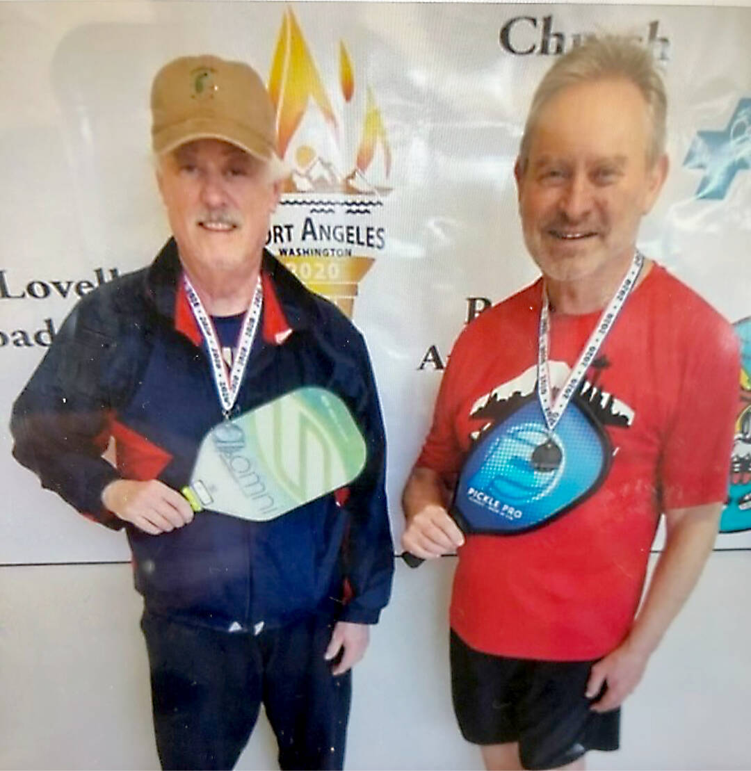 From left, John Doherty and Chris Berry were the men’s doubles 3.0 gold medal winners at the Olympic Pickleball Tournament.